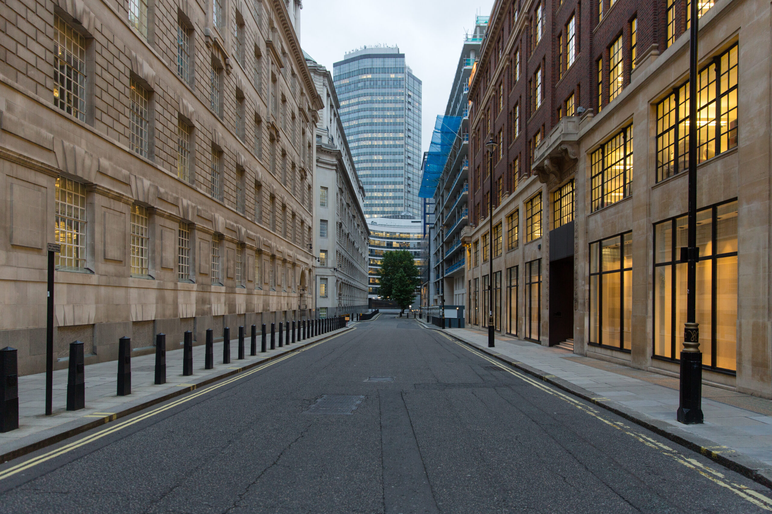 Empty street in Westminster, London, UK - featuring double yellow lines running down the kerbside / curbside