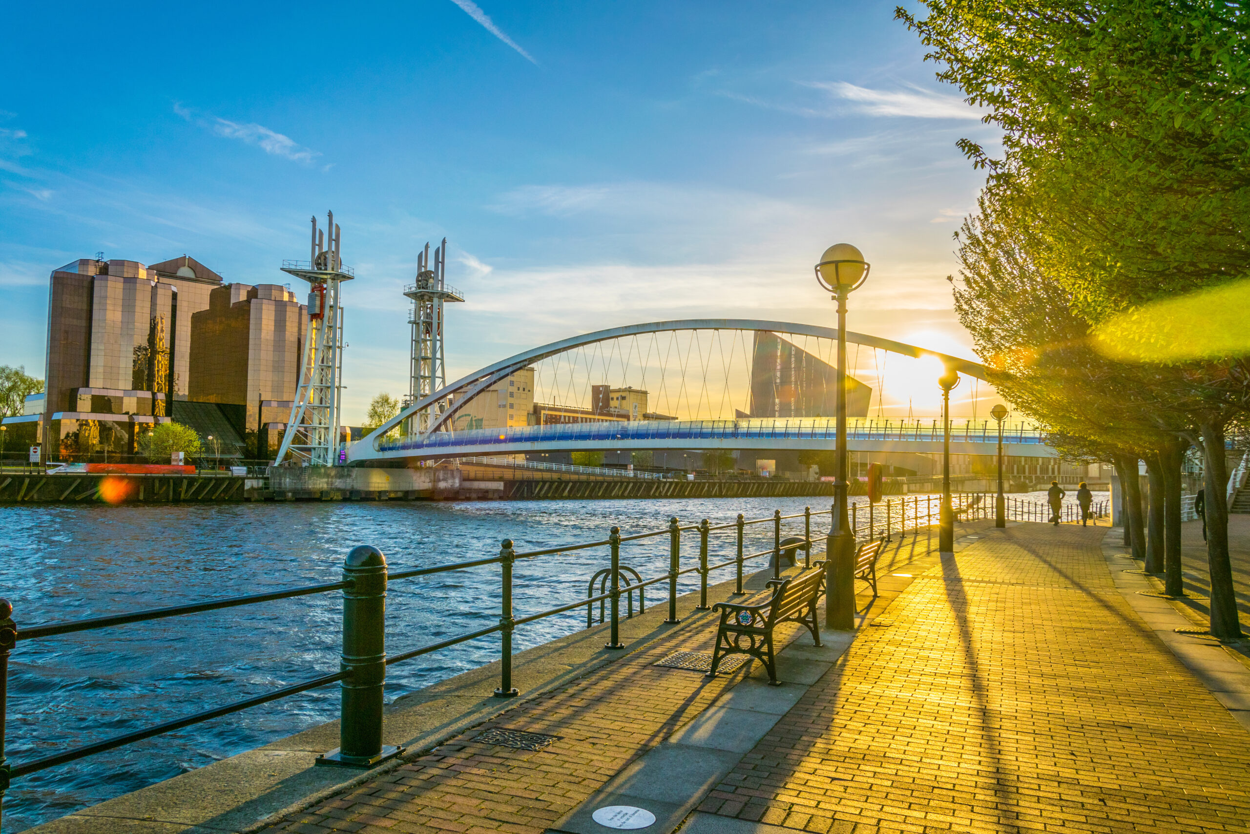 Sun setting behind a bridge in London, UK