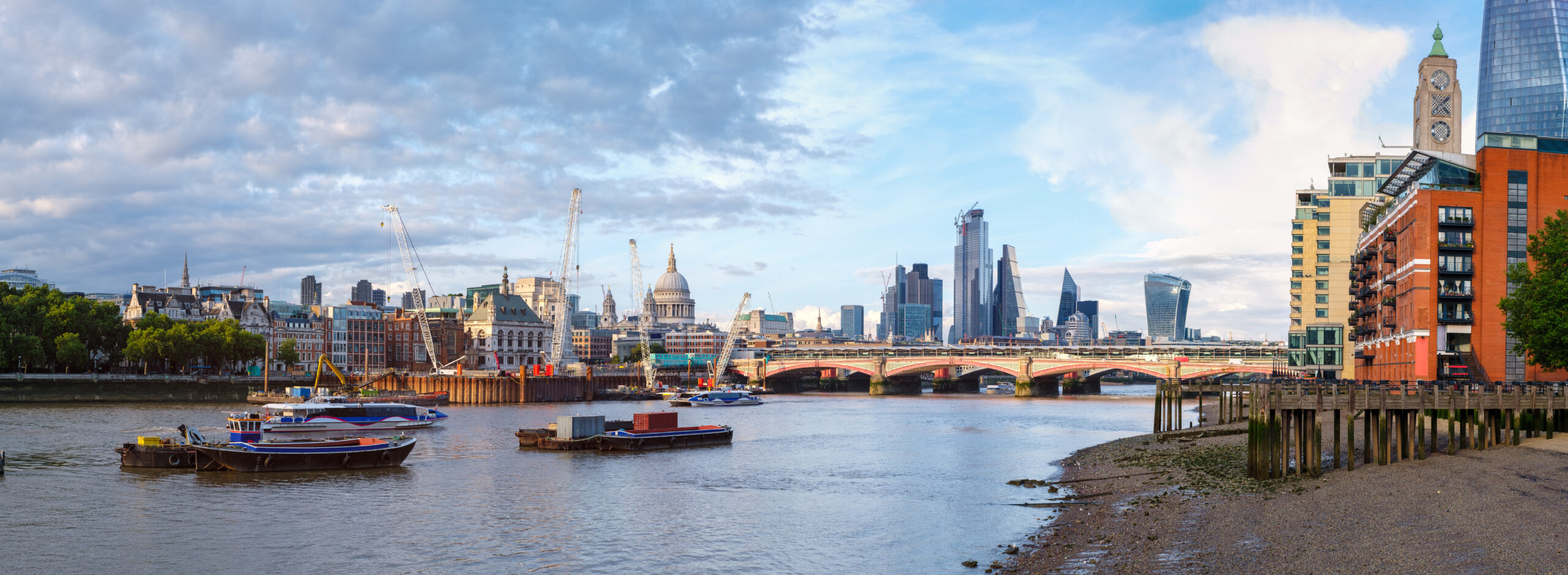 Very high resolution panoramic image of London at sunset with the river Thames, St Paul Cathedral, Blackfriars Bridge and the City - All logos and trademarks removed