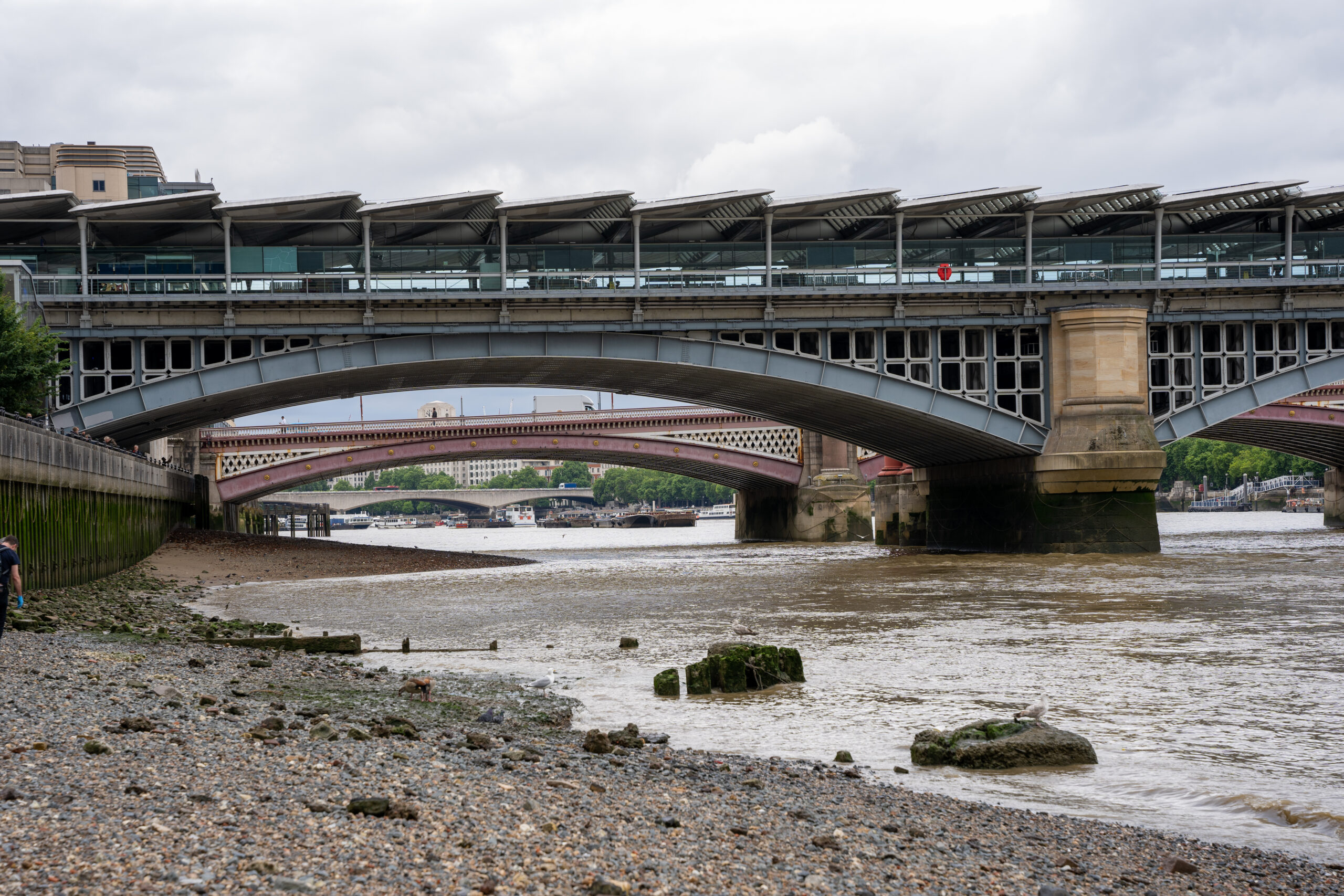Under bridge shot of the Thames River, London, UK